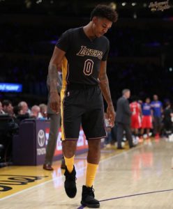 Swaggy P rocking the Black Yeezy 750 on court