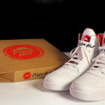 Pie Top sneakers next to a Pizza Hut Box